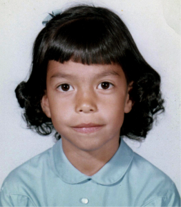 Portrait of artist Annie Lopez at a younger age.